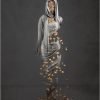 award winning figurative art featuring silver silk and falling autumn leaves revealing the female figure