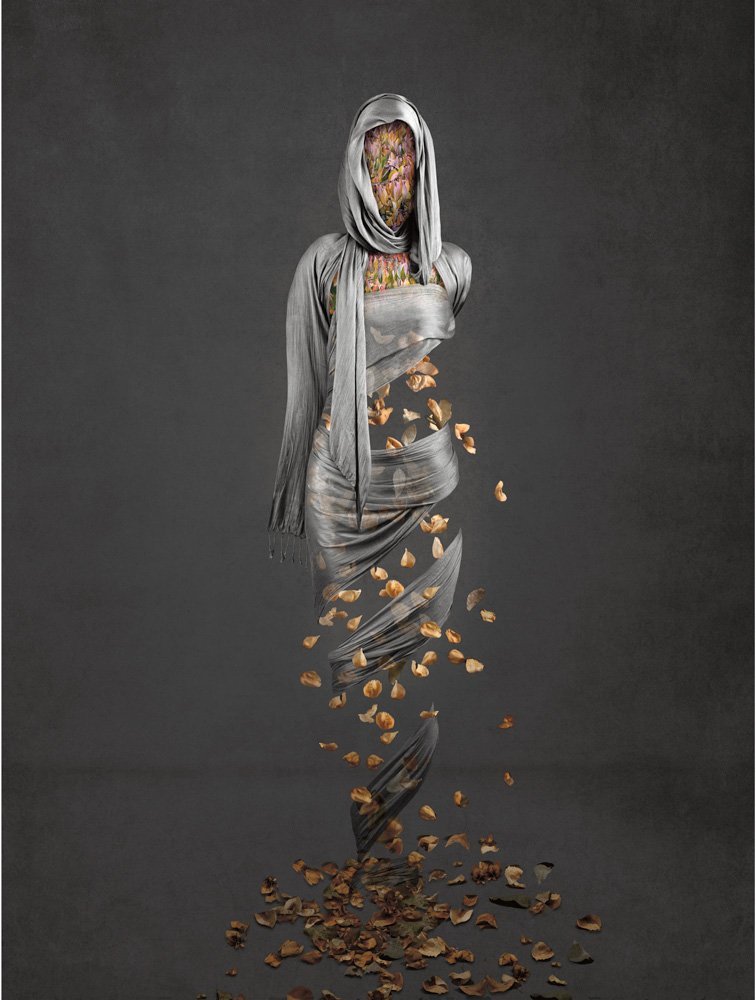 award winning figurative art featuring silver silk and falling autumn leaves revealing the female figure