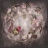 photographic art featuring flowers and clouds in a sphere