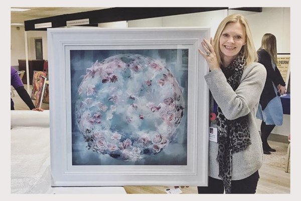 Artists Kirsteen Titchener with photo art piece Flora at Windsor art fair