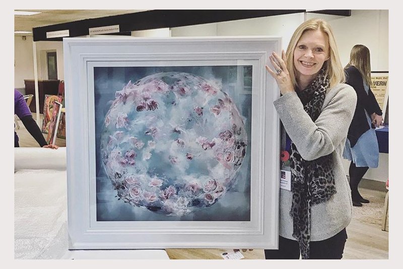 Artist Kirsteen Titchener with photo art piece Flora at Windsor art fair